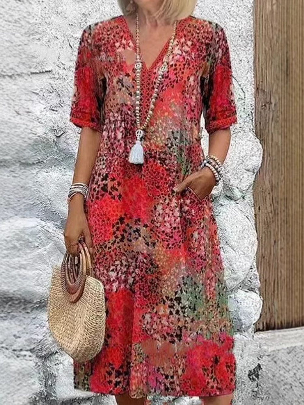 Maxi dress for women with V-neckline and practical side pockets Lune London