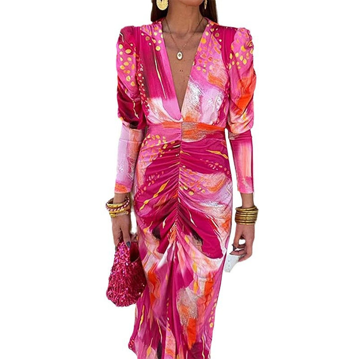 Robe maxi pour femmes avec un élégant décolleté en V et des manches bouffantes luxueuses Chic & Stil