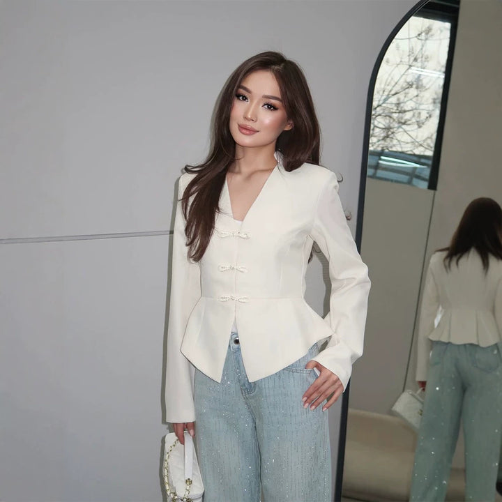 Women's peplum blazer with mandarin-like neckline and decorative knot fastenings Amarae