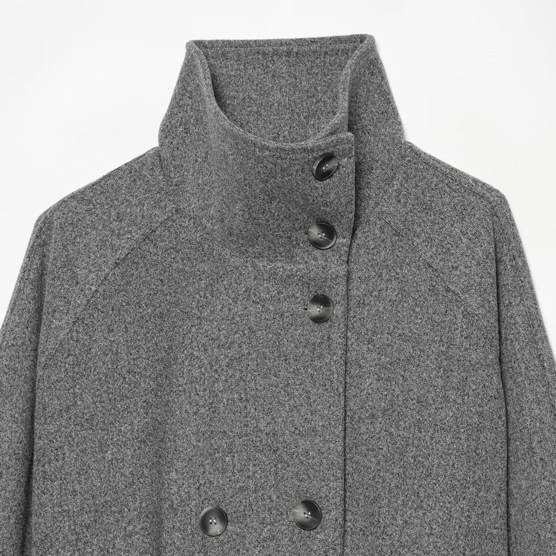 Women's cape transitional jacket in a short cut with a high collar, double button placket, and waist tie belt Amarae