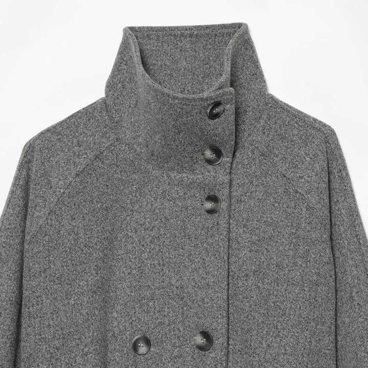 Women's cape transitional jacket in a short cut with a high collar, double button placket, and waist tie belt Amarae
