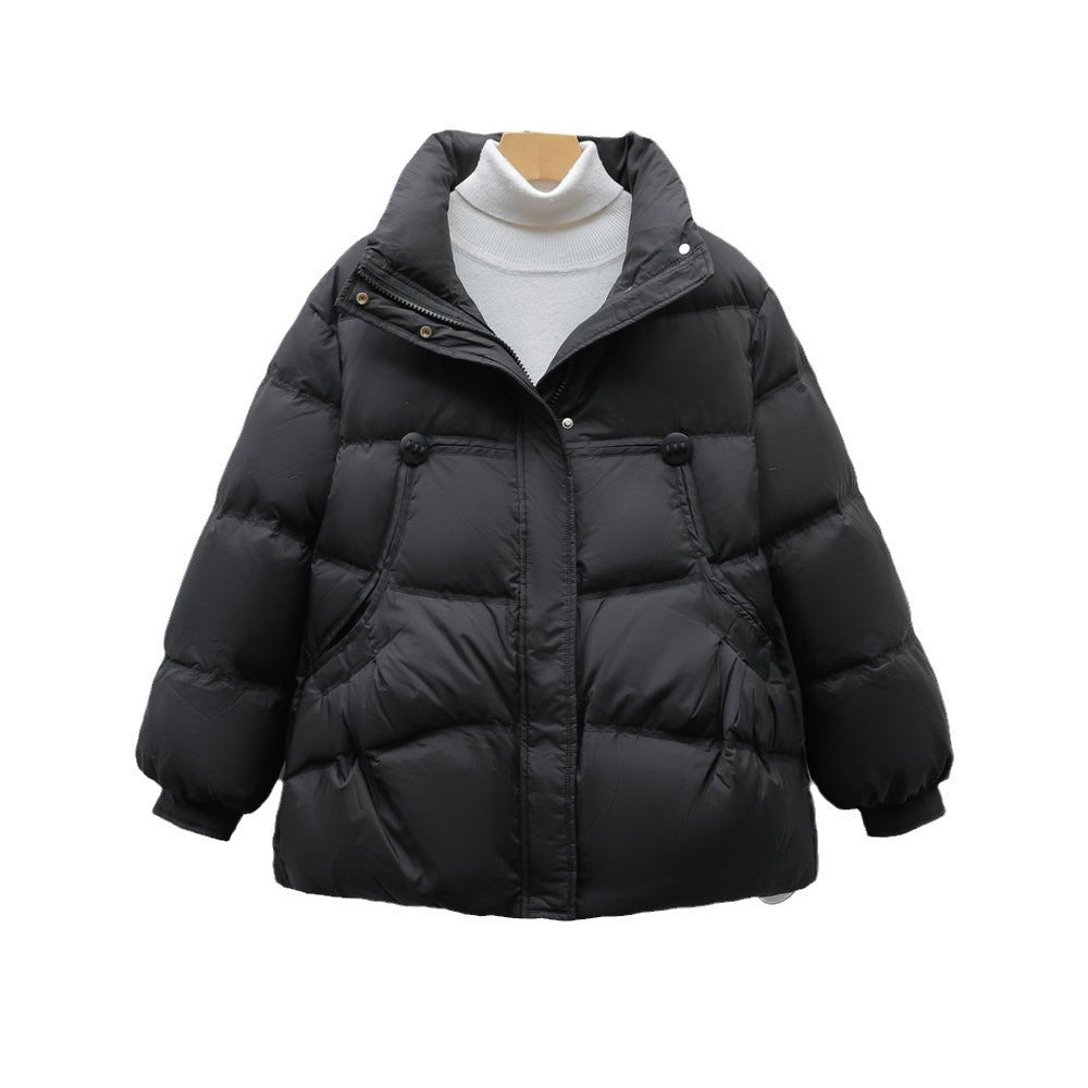 Bulky winter jacket for women with practical pockets and high collar Lune London