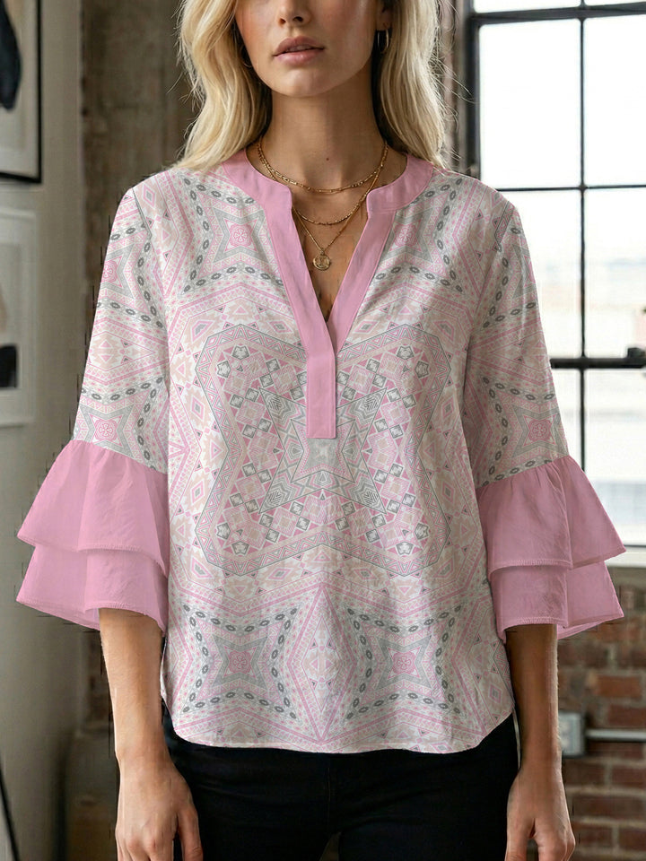 Women's blouse with voluminous ruffle sleeves and creative floral design Lune London