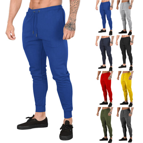 Men's sporty jogger pants with elastic waistband and practical zip pockets Amarae