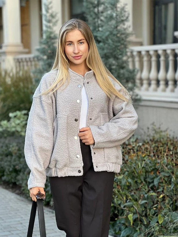 Women's teddy fleece bomber jacket in boxy cut with snap button closure and patch pockets Amarae