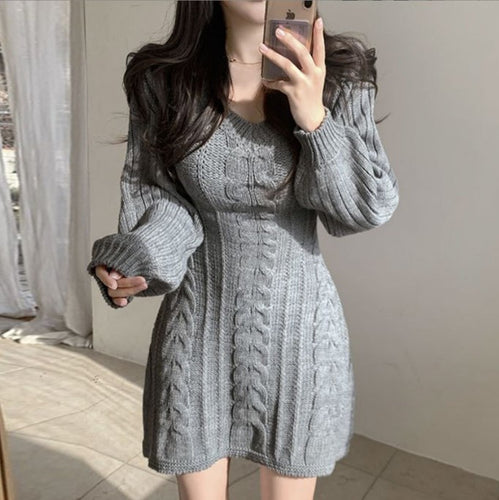 Knitted dress for women with a loose fit and elegant braid details Amarae
