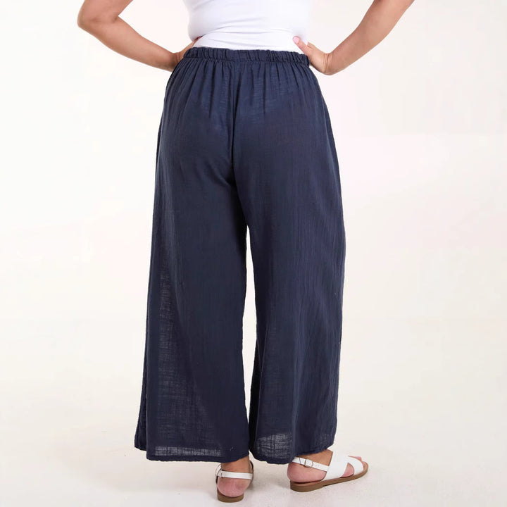 Light chiffon pants for women with elastic waist and practical pockets Lune London