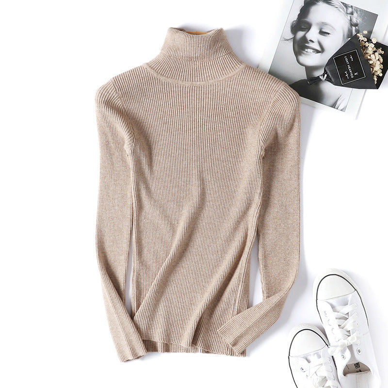 Women's turtleneck sweater with a fine ribbed texture and a fitted cut Lune Londonl