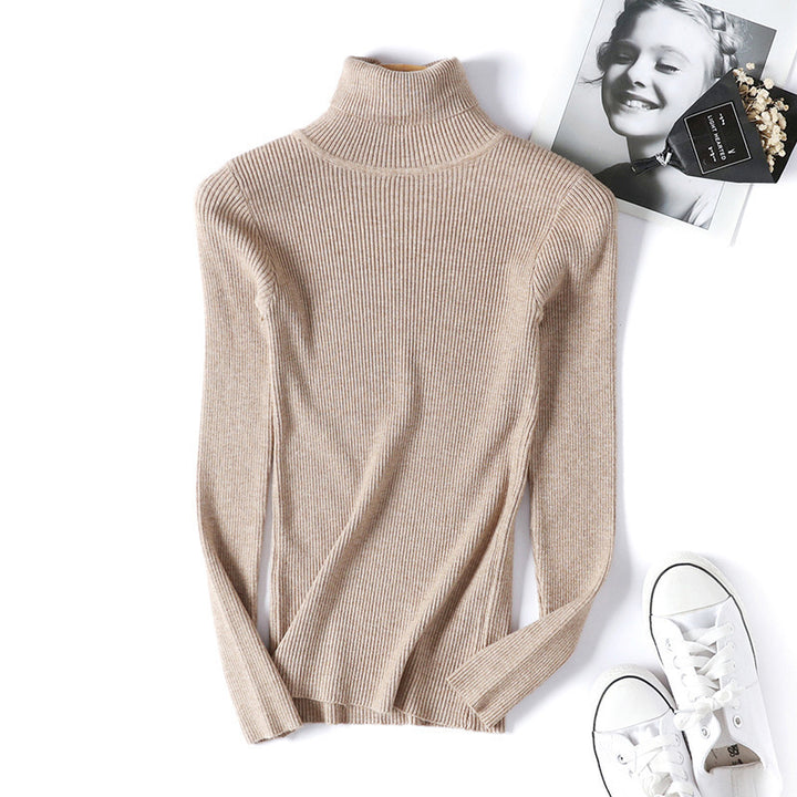 Women's turtleneck sweater with a fine ribbed texture and a fitted cut Lune Londonl