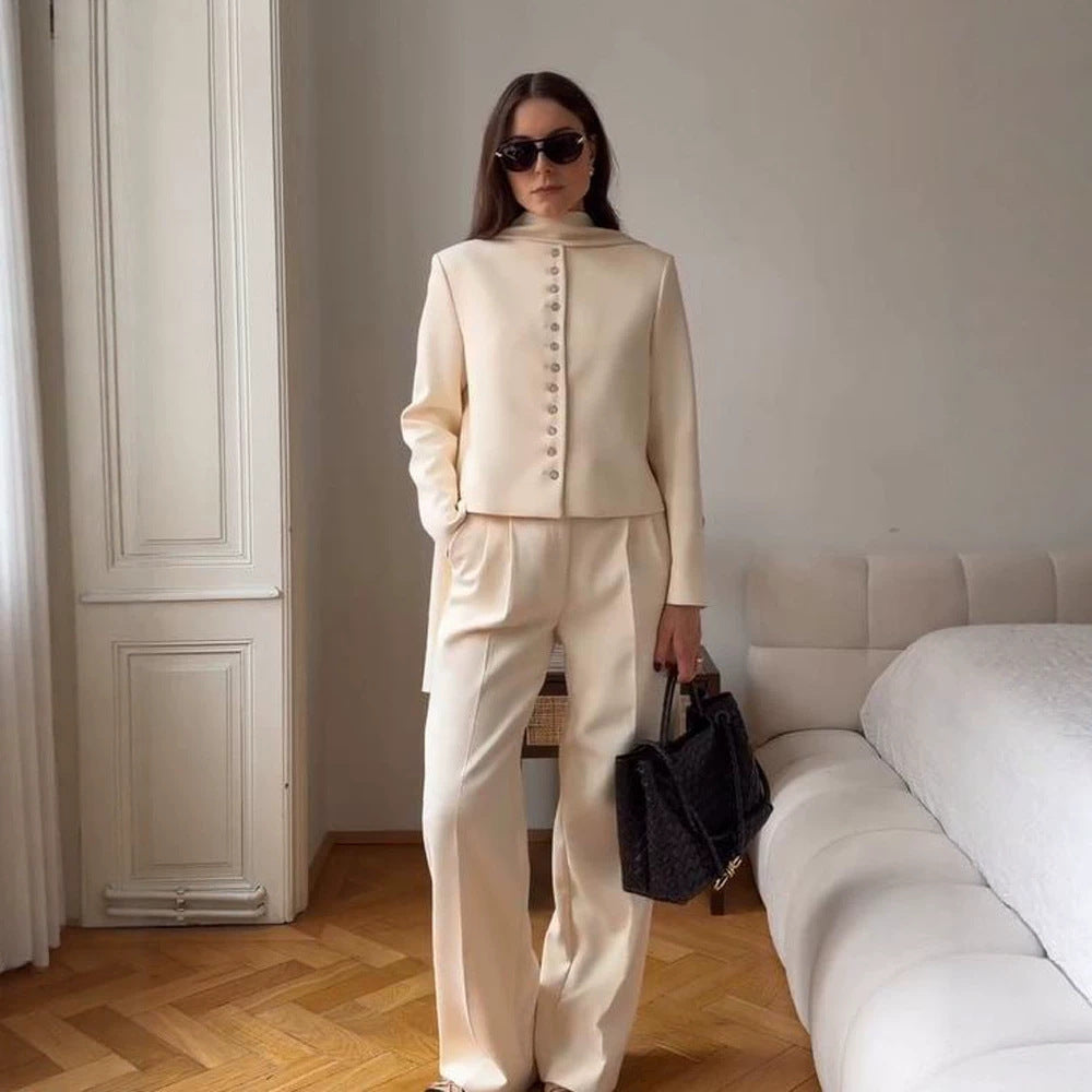 Women Elegant fitted short blazer with standing collar and decorative button placket Amarae
