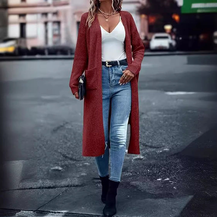 Long knit coat for women with structured design and practical pockets Lune London