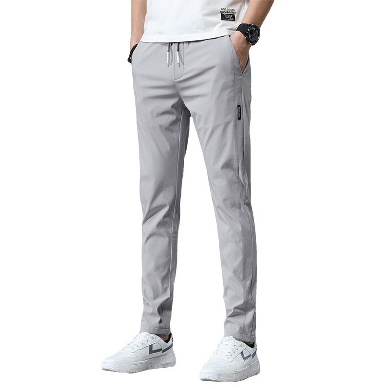Men's sports pants with adjustable drawstring and zippered pockets on the sides Lune London