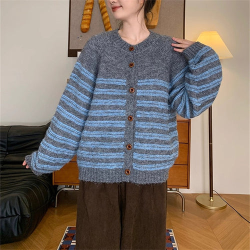 Ladies Chunky Knit Jacket with Modern Stripes and Chic Button Details and Style