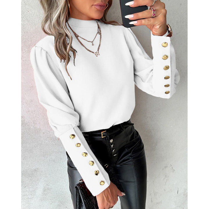 Elegant blouse for women with puff sleeves and golden button details Lune London