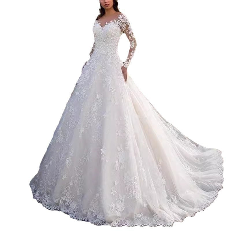 Women's Wedding Dress with Elegant Lace Detailing and Voluminous Skirt Lune London