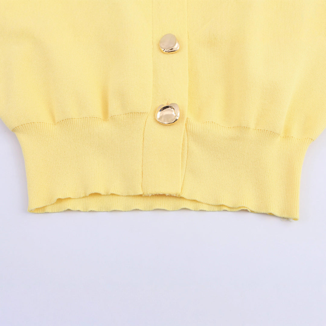 Women’s casual cardigan with puff sleeves and stylish button details Lune London