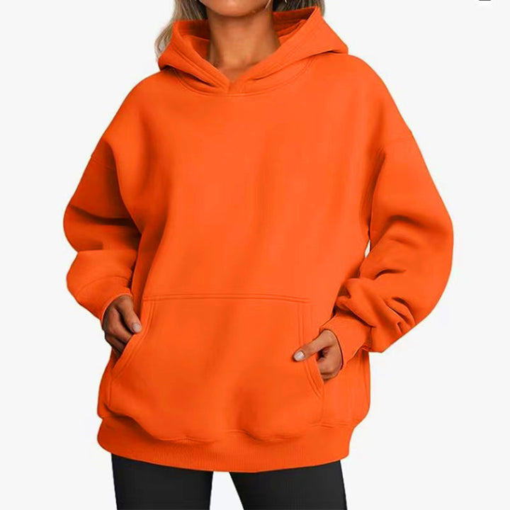 Women's oversized hoodie with practical kangaroo pockets and soft inner lining Chic & Stil