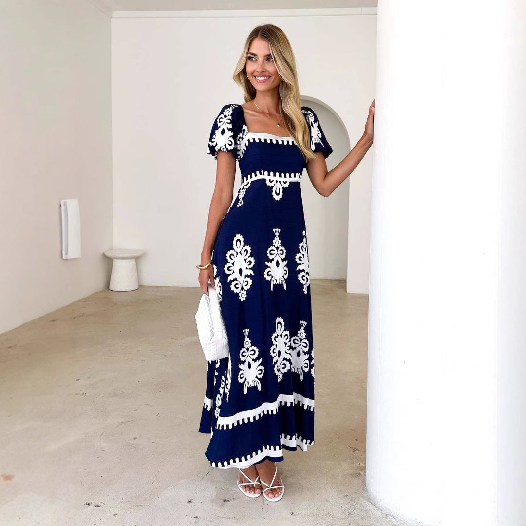 Women's maxi dress with elegant ruffle details and floral pattern Lune London