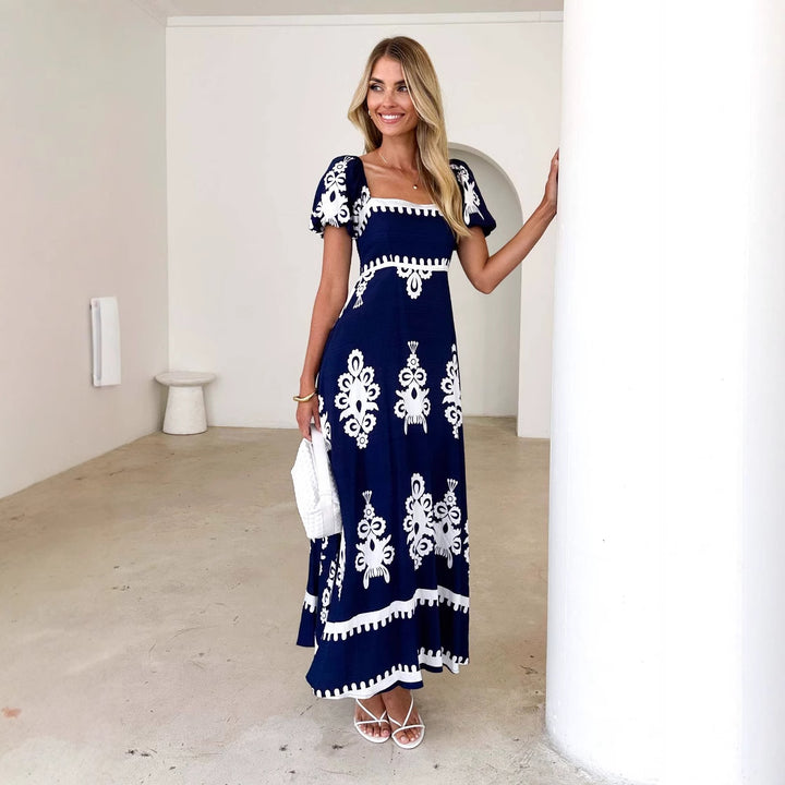 Women's maxi dress with elegant ruffle details and floral pattern Lune London