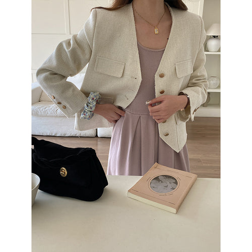 Women's fashionable jacket with textured design and double button placket Chic & Stil