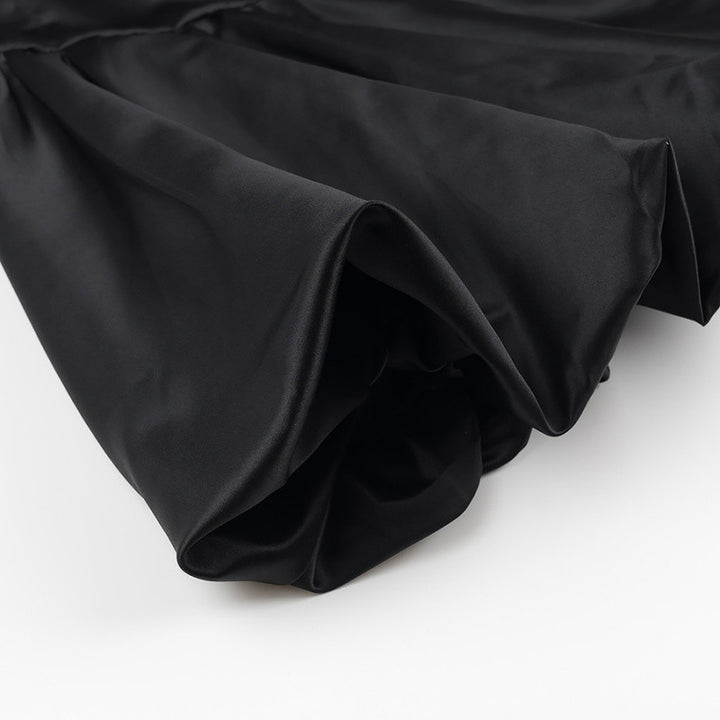 Robe élégante pour femmes avec manches transparentes et col haut Chic & Stil