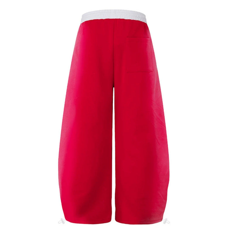 Women's extra-wide culotte sweatpants in palazzo style with a high comfort waistband, drawstring, and gothic cross print Amarae