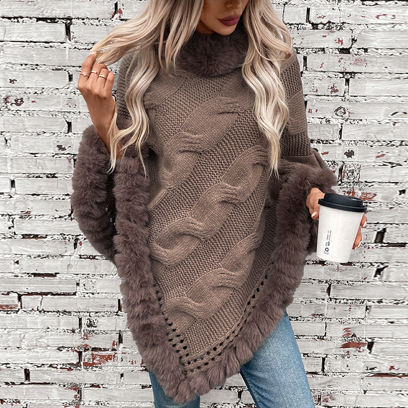 Ladies cozy poncho sweater with soft faux fur trim and cable knit pattern Lune London