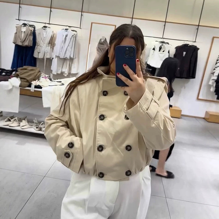 Women's tailored short trench coat with double-breasted style, stand collar and shoulder flaps Amarae