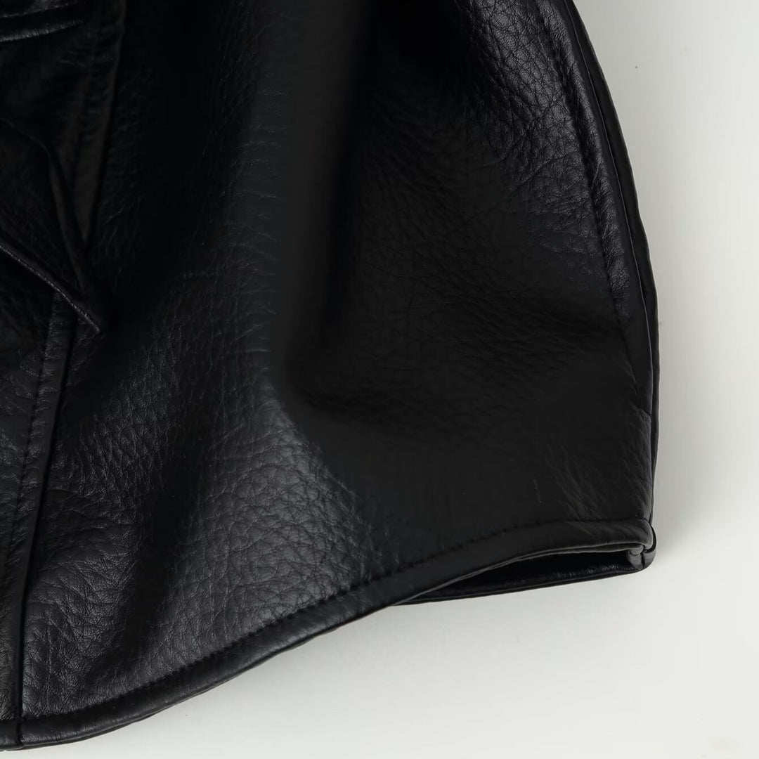 Women's short blazer made of vegan leather with shawl collar and waist tie belt Amarae