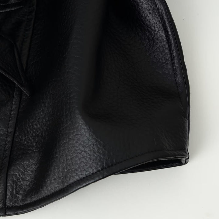 Women's short blazer made of vegan leather with shawl collar and waist tie belt Amarae