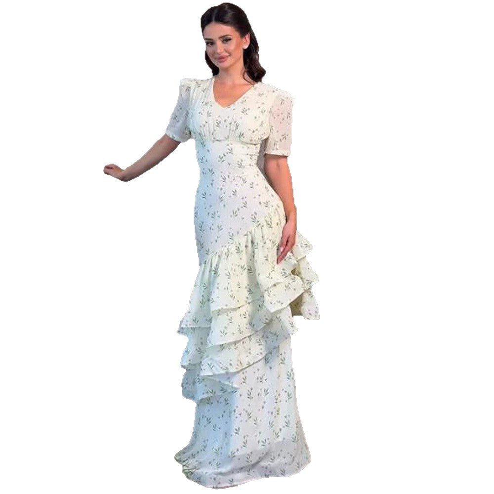 Women’s maxi dress in vintage-romantic style with asymmetric ruffles and puff sleeves Amarae