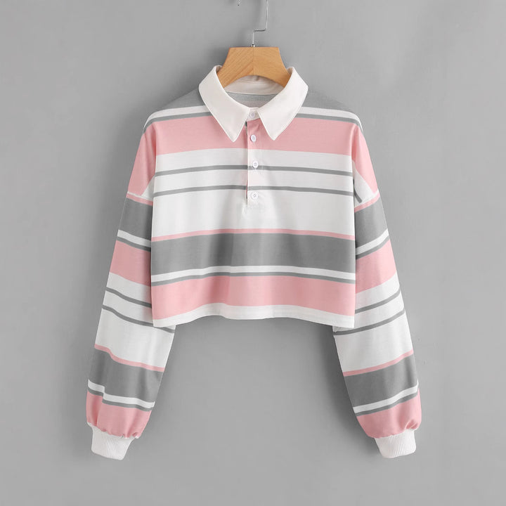 Women's polo shirt in a casual crop design with a stylish color block pattern Chic & Stil