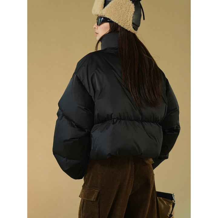 Women's short quilted puffer jacket with high standing collar and insulating filling Amarae