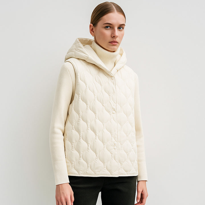 Ladies padded vests with hidden hood and soft inner lining Amarae