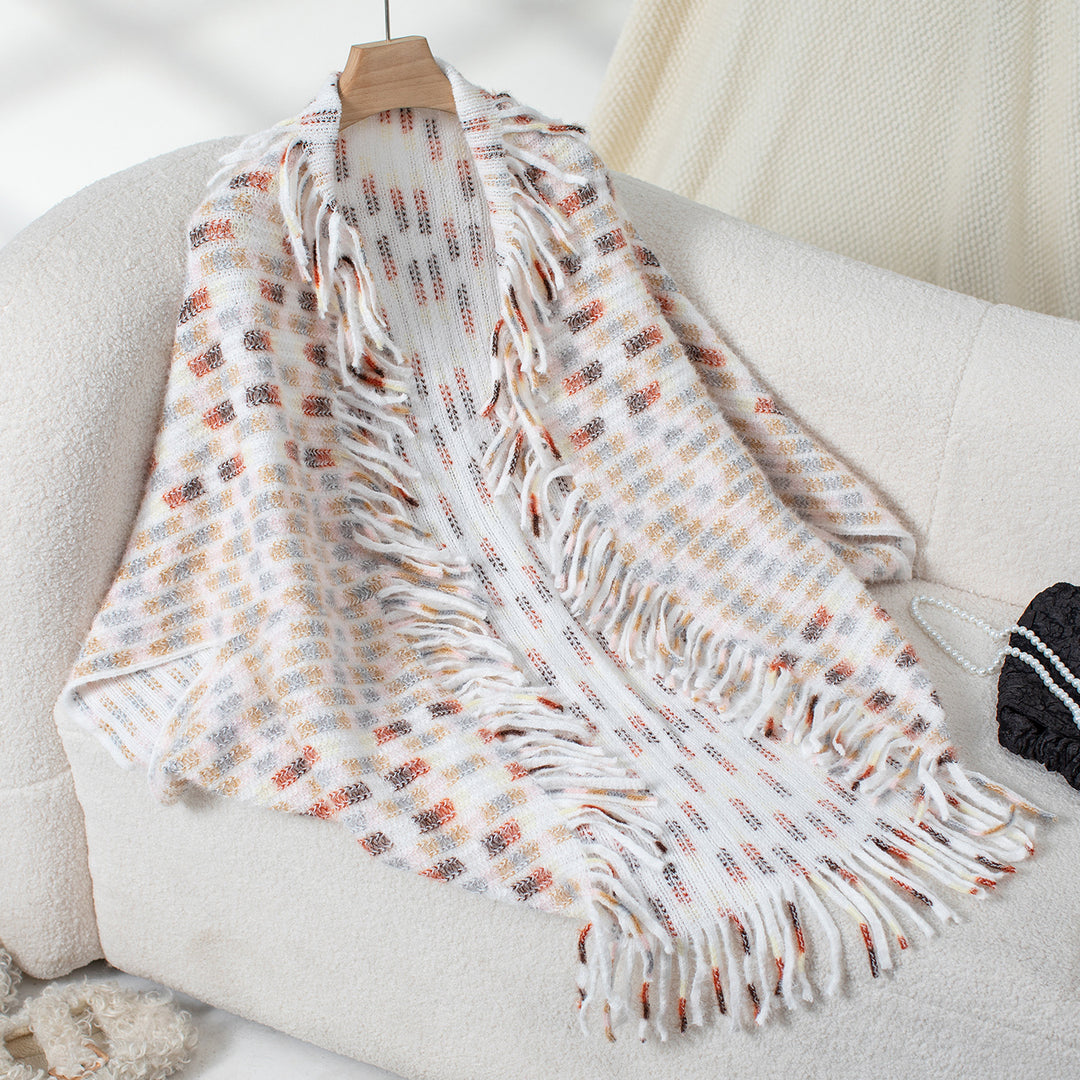 Ladies elegant poncho with fringed details and a modern plaid pattern Lune London