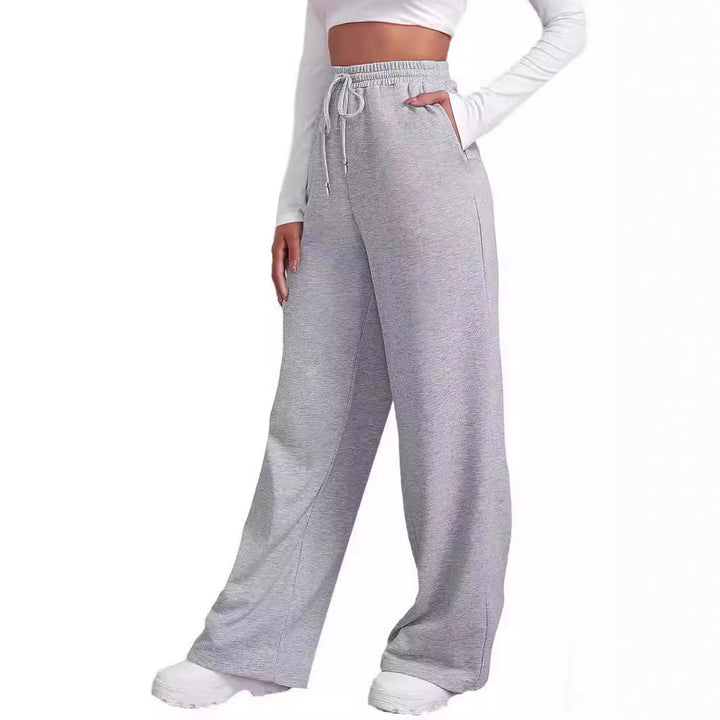 Women's loose-fitting leisure pants with elastic waistband and side pockets Chic & Stil