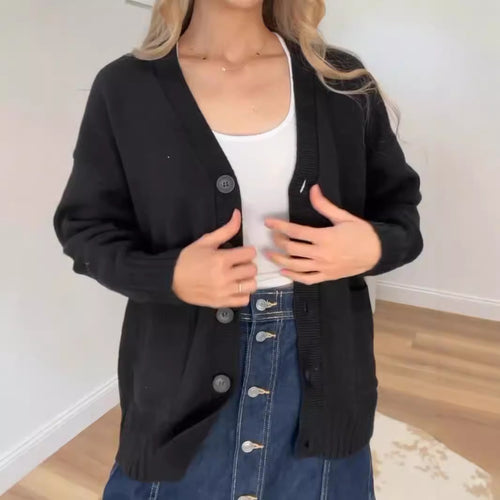 Women's knitted jacket with pockets and modern buttons Amarae