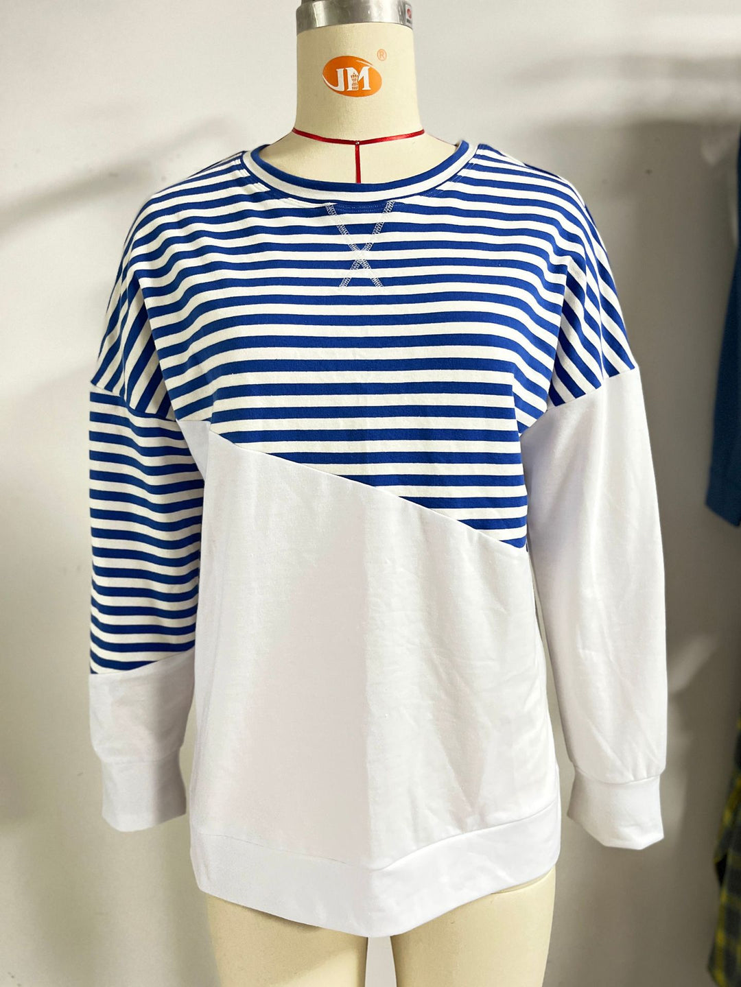 Casual women's sweatshirt with striped design and contrasting hem Amarae