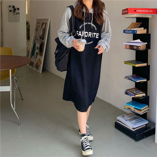 Women’s hoodie dress in casual oversized style with graphic print and side pockets