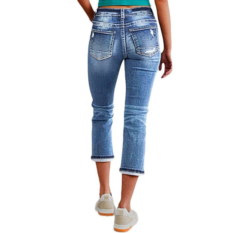 Women's cropped jeans with turn-up, mid-rise waist and used wash Amarae