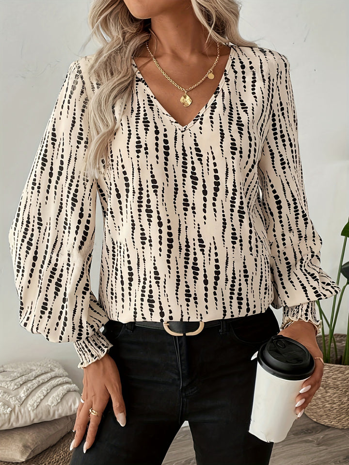 Women's blouse with V-neck and puff sleeves Lune London