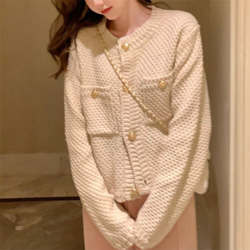 Gilet pour femmes avec des boutons décoratifs et des poches intégrées Chic & Stil