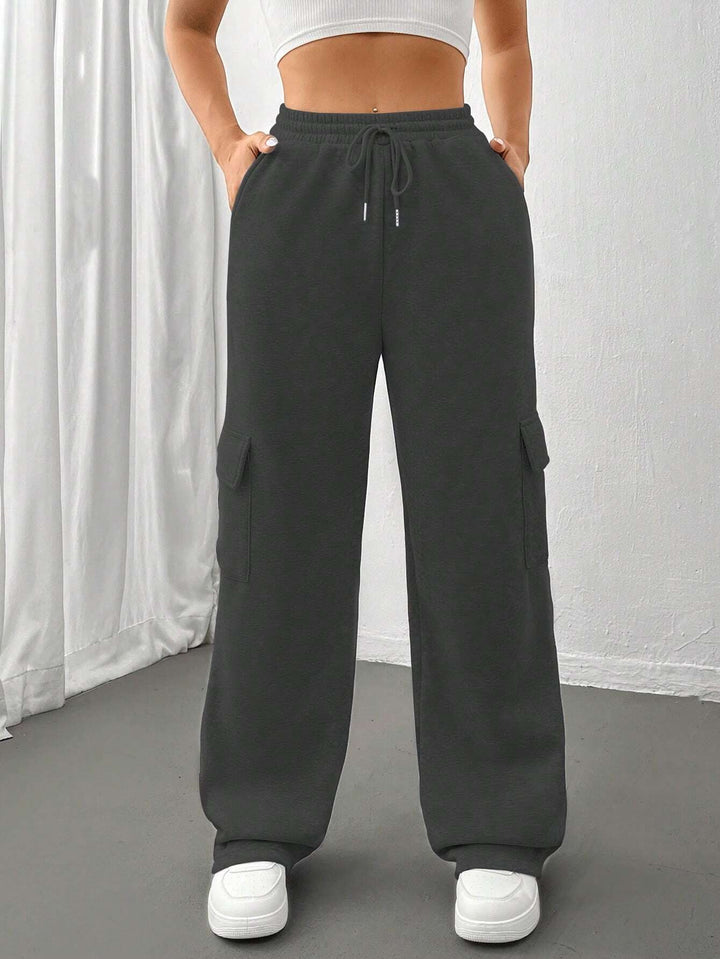 Ladies cargo jogging pants with high elastic waistband, drawstring, and wide leg Amarae