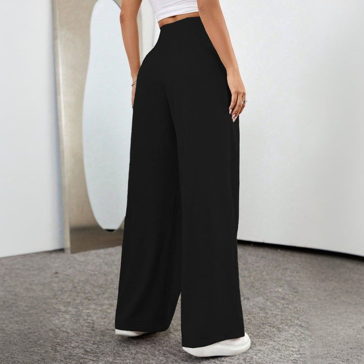 Pantalons palazzo taille haute généreux pour femmes avec élégants plis et bouton visible Chic & Stil