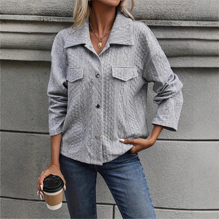 Ladies' knitted jacket with textured cable design and practical pockets Lune London
