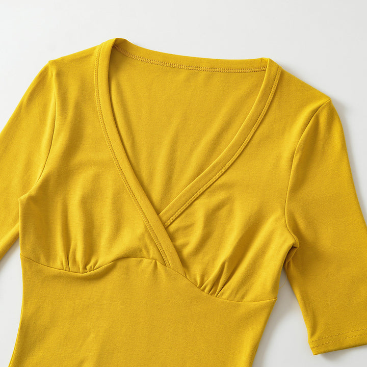 Women's body-hugging wrap shirt with deep V-neck, three-quarter sleeves, and waist accentuation Amarae