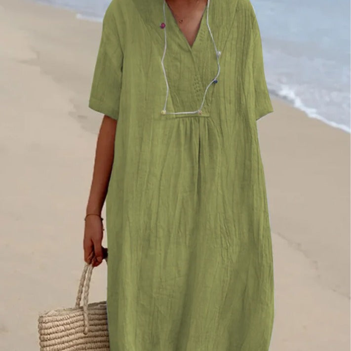 Casual beach dress for women with V-neckline and flowy design Lune London