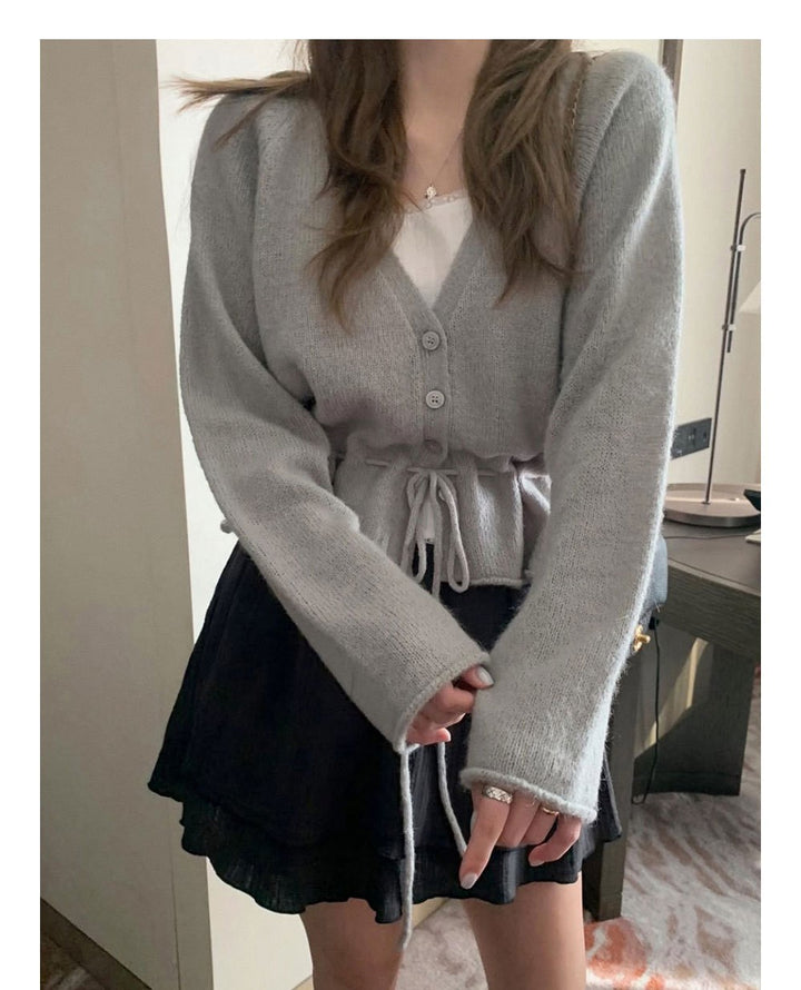 Cardigan pour femmes avec ceinture ajustable et manches aérées Chic & Stil