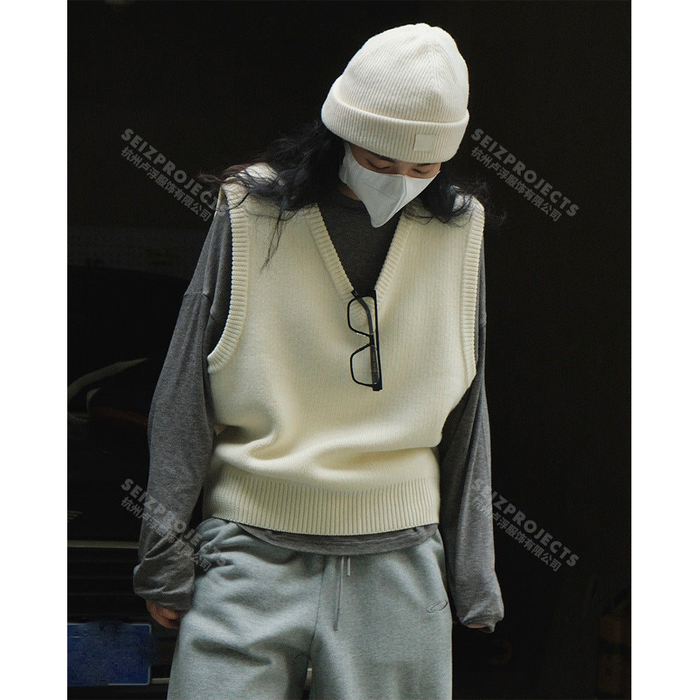 Women's sleeveless knitted vest in boxy cut with deep V-neckline and ribbed hem Amarae
