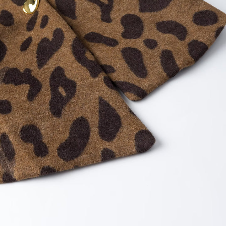 Ladies sleeveless wool blend vest in leopard print with V-neck and decorative button Amarae